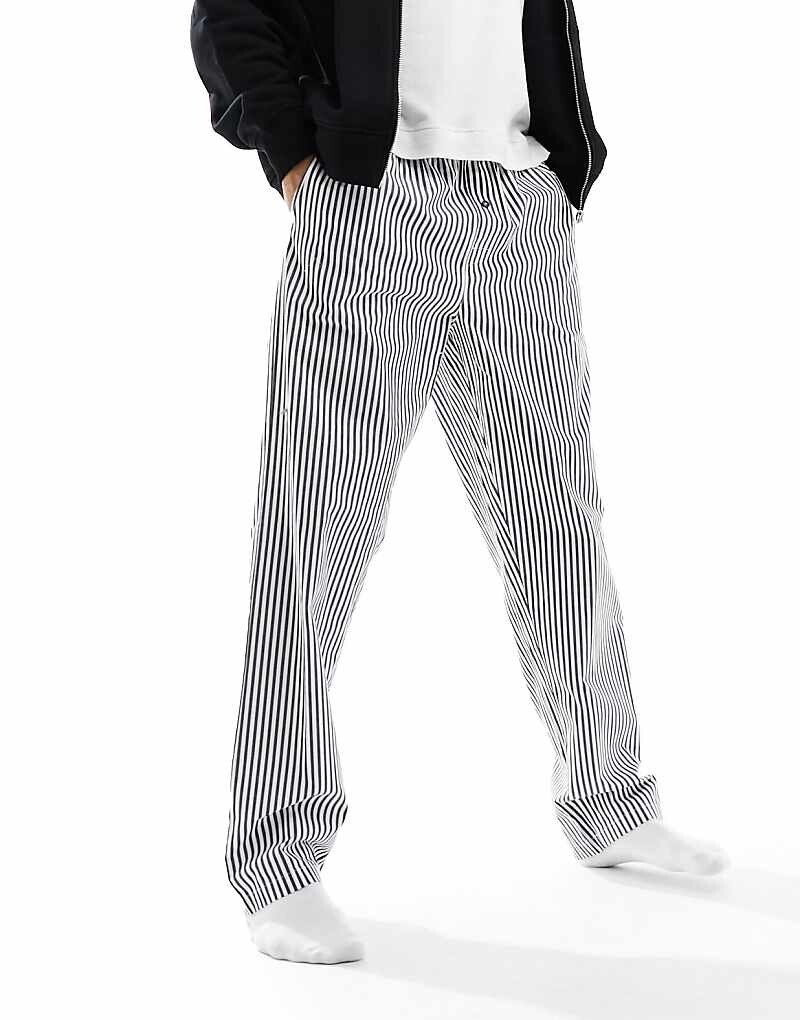

Tommy Hilfiger – Monotype – Брюки для отдыха в синюю полоску