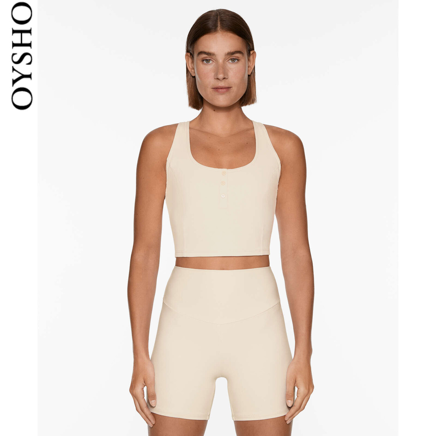 

Топ спортивный Oysho короткий, абрикосовый