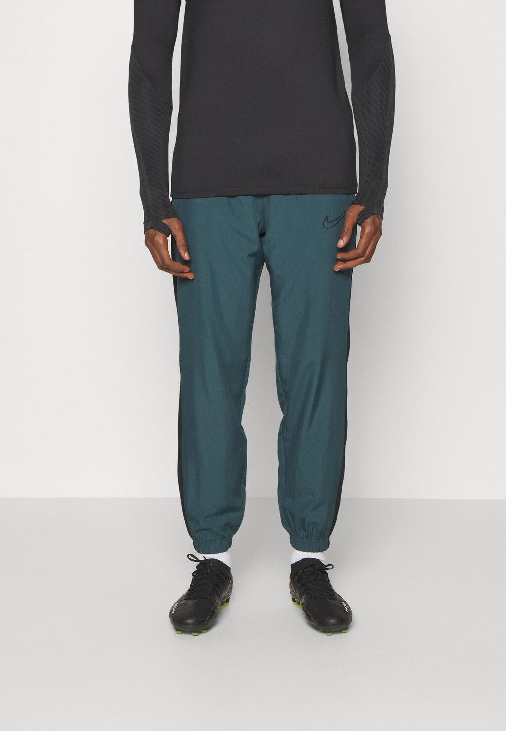 

Спортивные брюки M NK DF ACD23 TRK PANT WP BR Nike, глубокие джунгли/черный