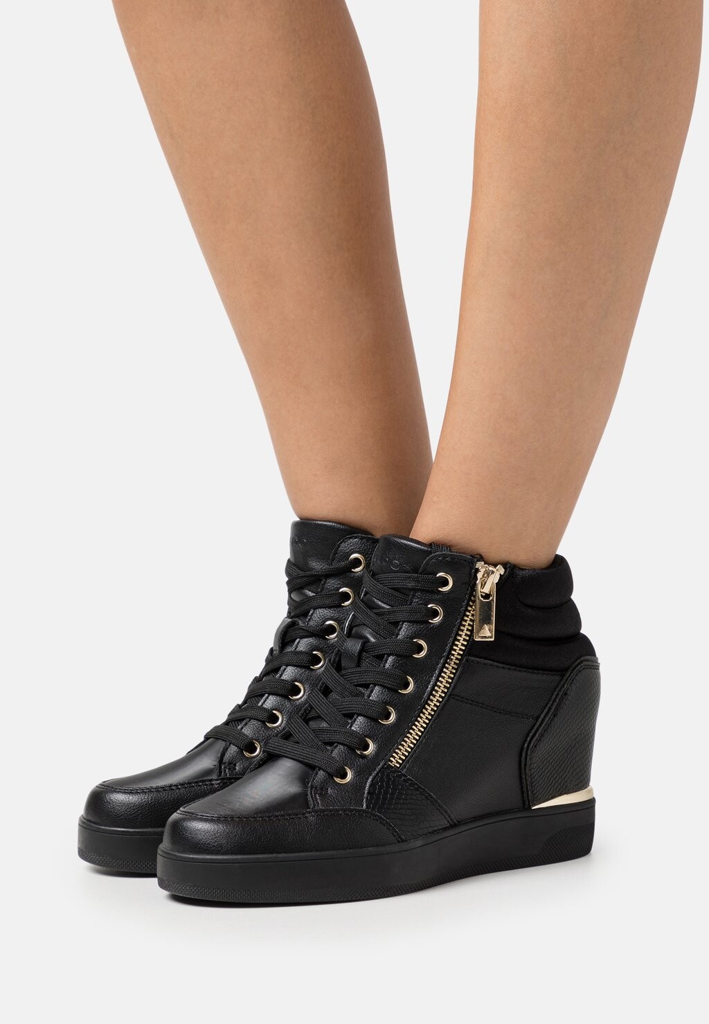 

Ботильоны на танкетке ALDO