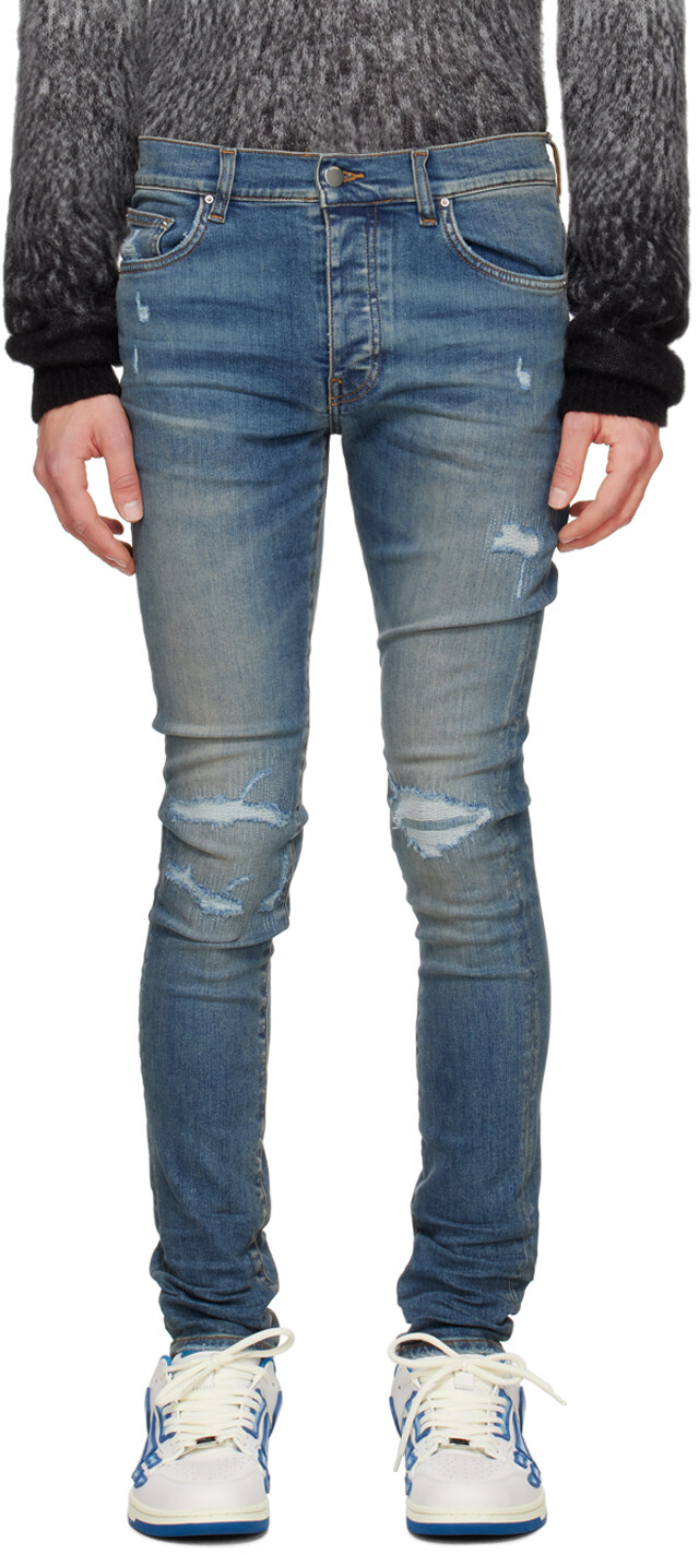 

Синие джинсы MX1 с потертостями Amiri
