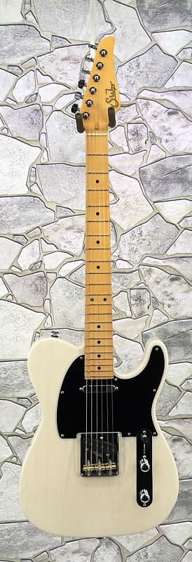 

Электрогитара Suhr Classic T in Transparent White with a Swamp Ash Body Maple Neck and SS &SSCI Pickups Including a Gig Bag