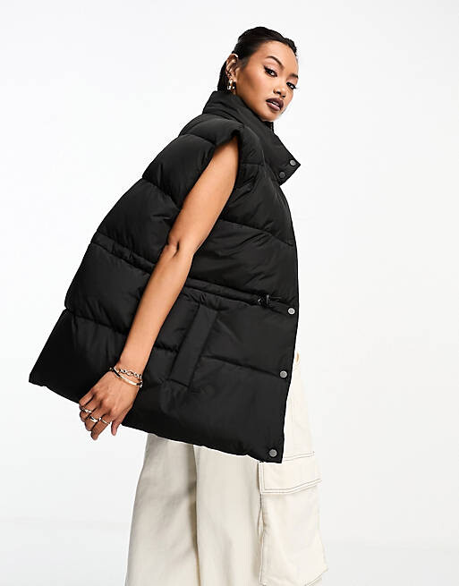 

Короткий черный жилет с банджи ASOS DESIGN