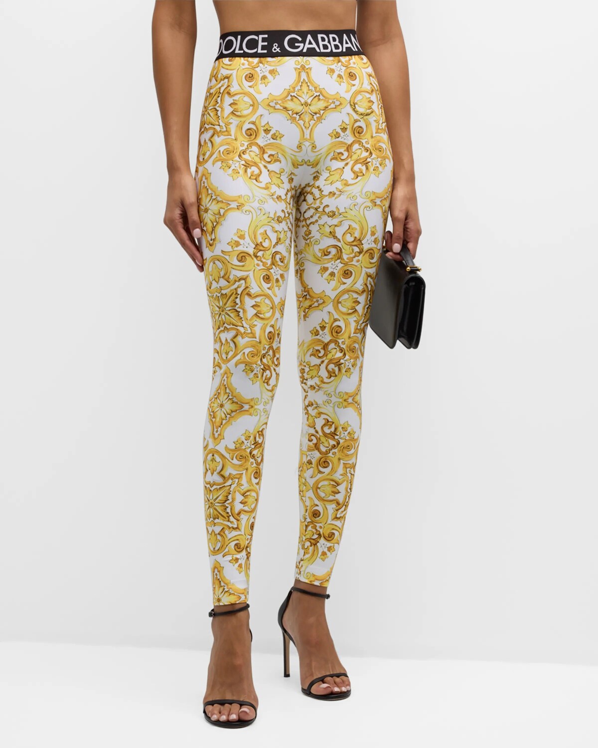 

Эластичные трикотажные леггинсы с фирменным принтом Dolce&Gabbana, цвет Yellow Prt