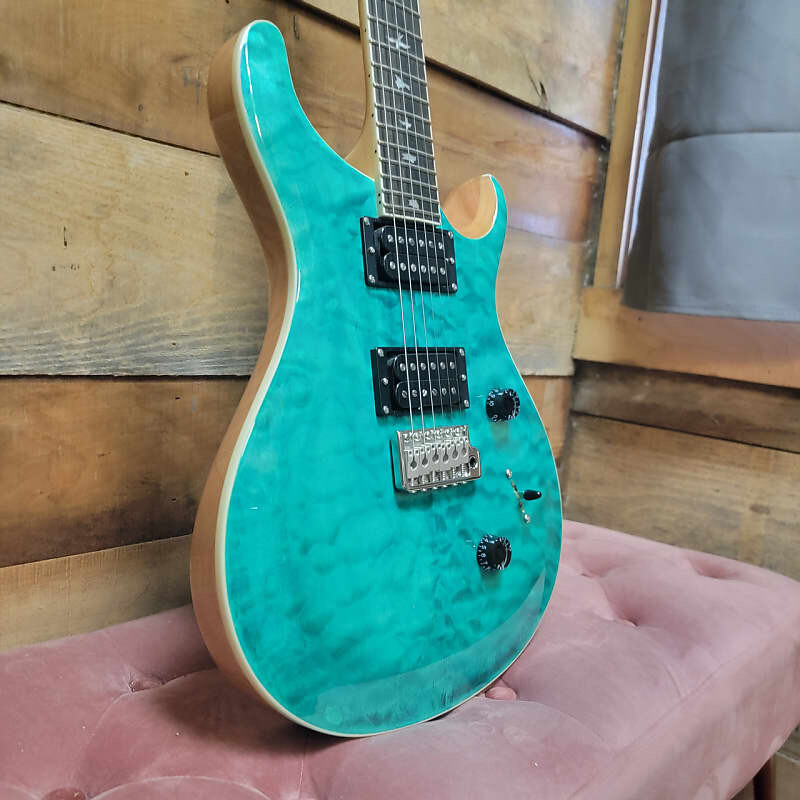 

Электрогитара PRS SE Custom 24 Quilt - Turquoise w/ Gig Bag