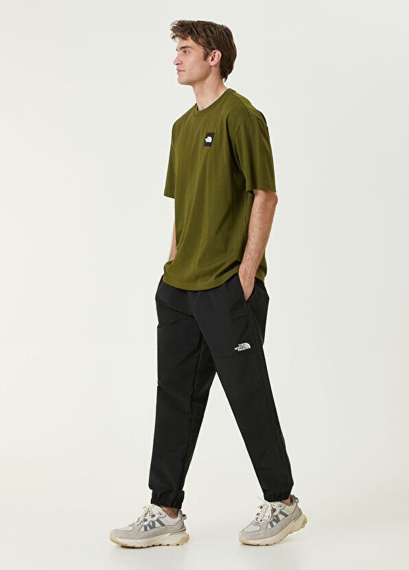 

Легкие ветровые спортивные штаны The North Face, черный