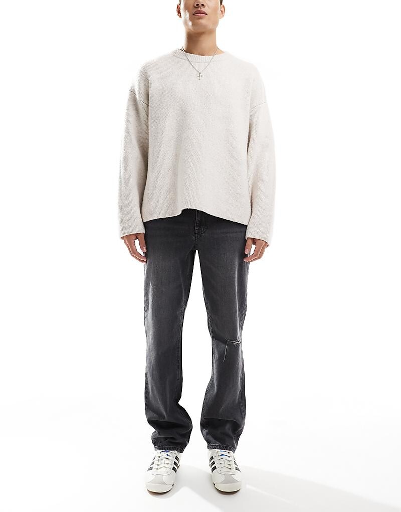 

Черные прямые джинсы с рваными краями ASOS DESIGN