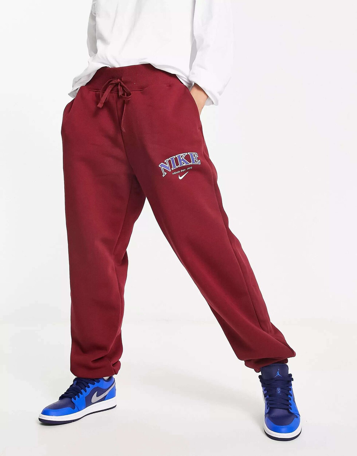 

Красные флисовые джоггеры с изображением феникса унисекс Nike Varsity
