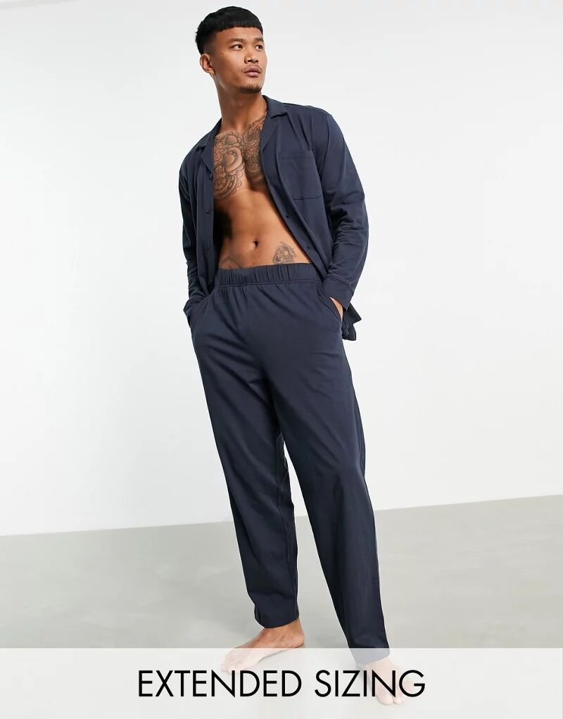 Пижамный комплект из джерси ASOS, состоящий из топа с длинными рукавами и темно-синих брюк