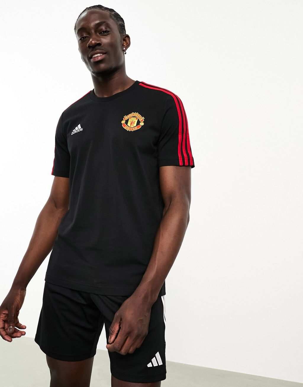

Черно-красная футболка DNA adidas Football Manchester United FC 2023/24