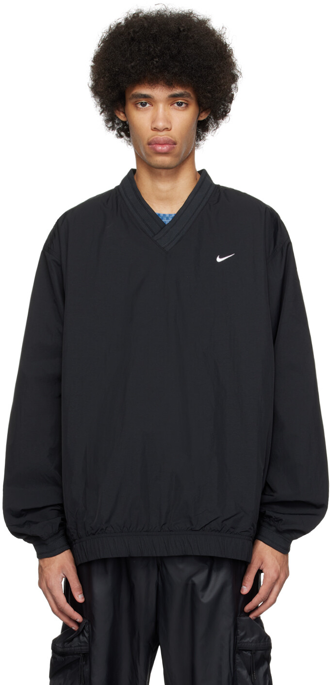 

Черная куртка Solo с галочкой Nike