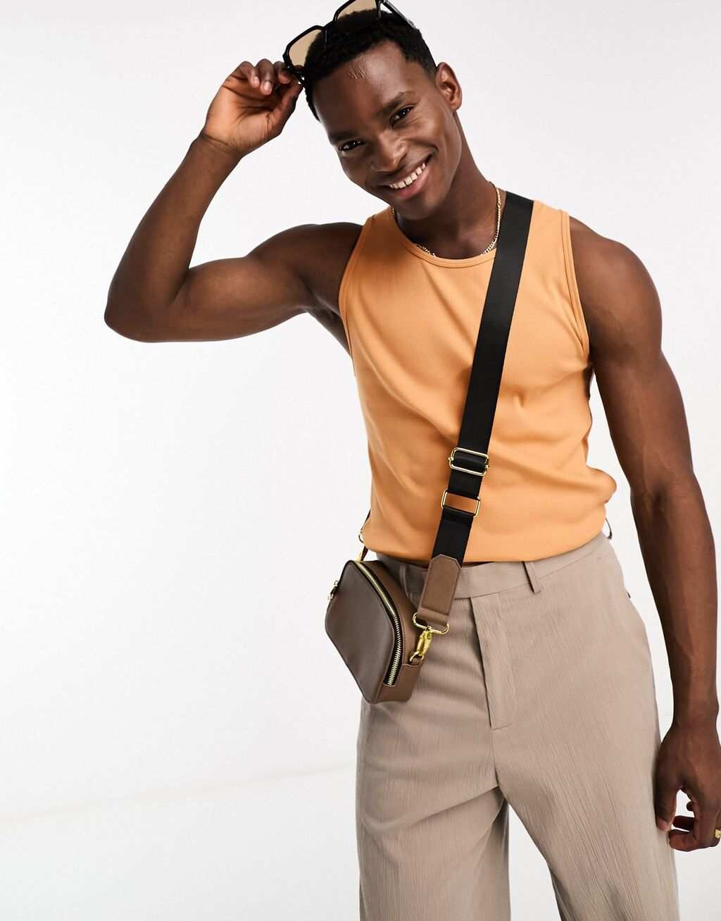 

Абрикосовый жилет в рубчик с мускулистым кроем ASOS DESIGN
