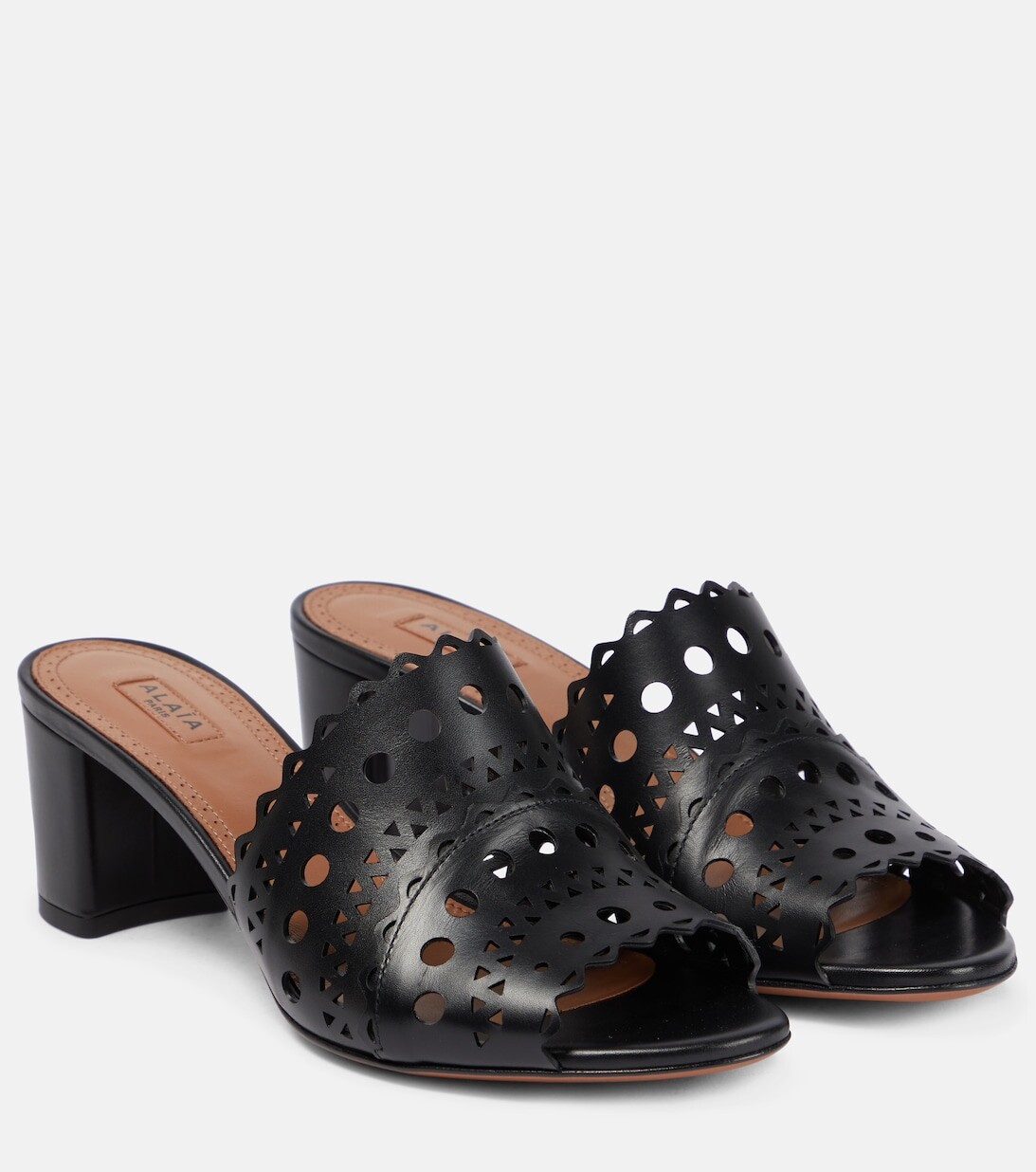 

Мюли из кожи с лазерной резкой Alaïa, черный