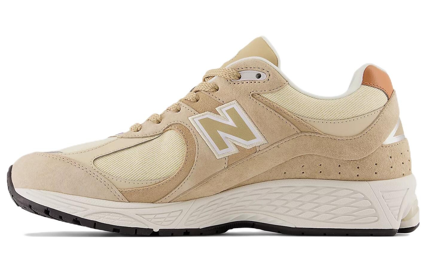 

Кроссовки унисекс New Balance 2002R, бежевый
