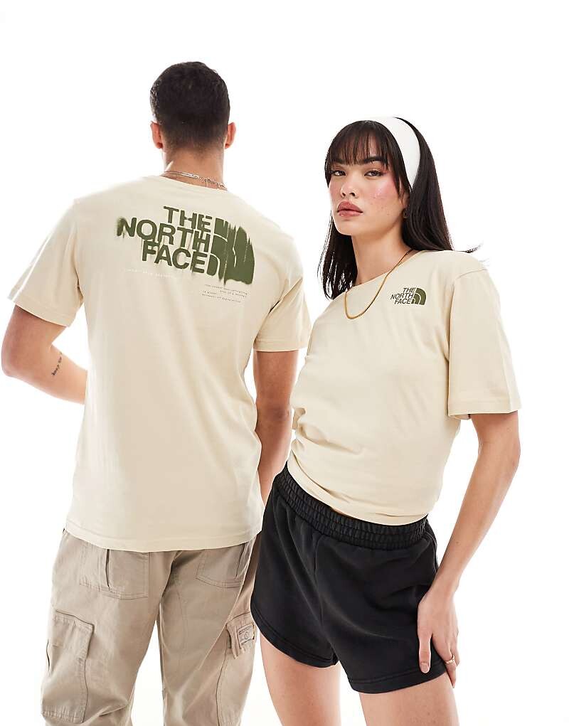

Бежевая футболка с графическим принтом The North Face