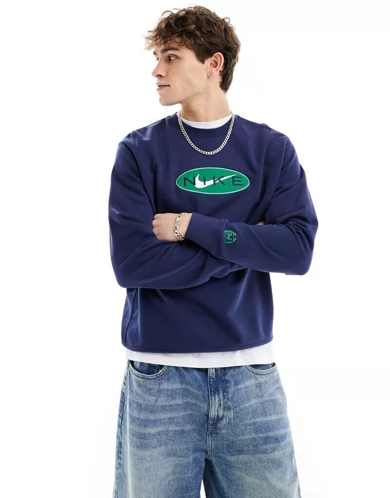 

Темно-синяя толстовка с логотипом на груди Nike