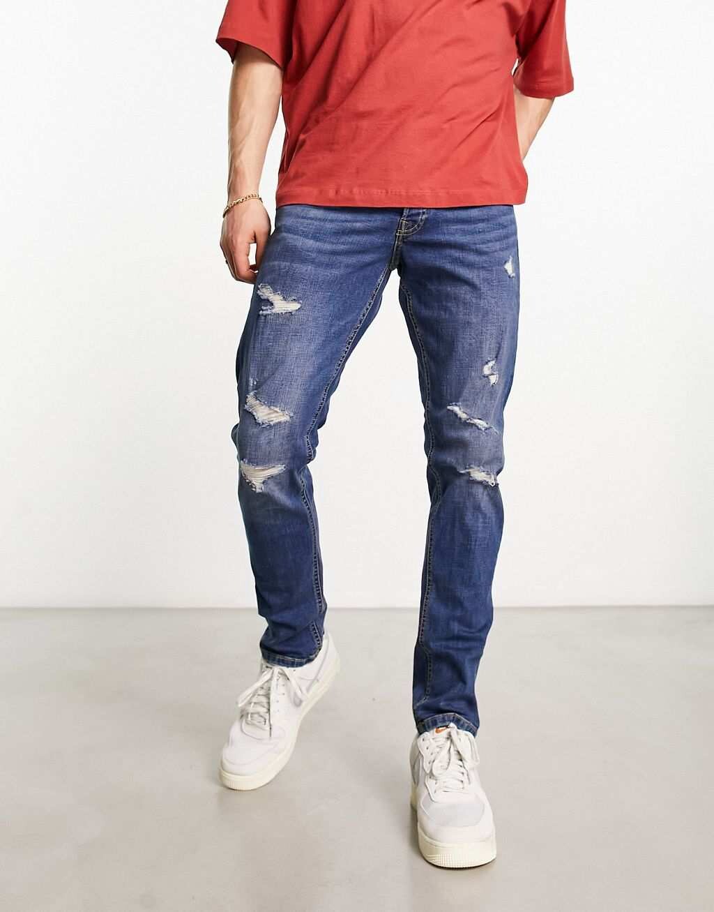 

Джинсы узкого кроя синего цвета с потертостями Jack & Jones Intelligence glenn