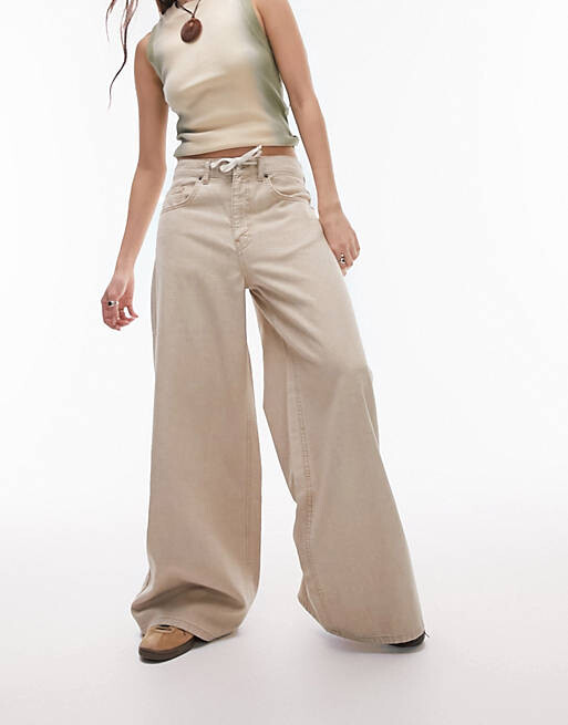 

Песочные широкие джинсы с низкой посадкой и кулиской Topshop