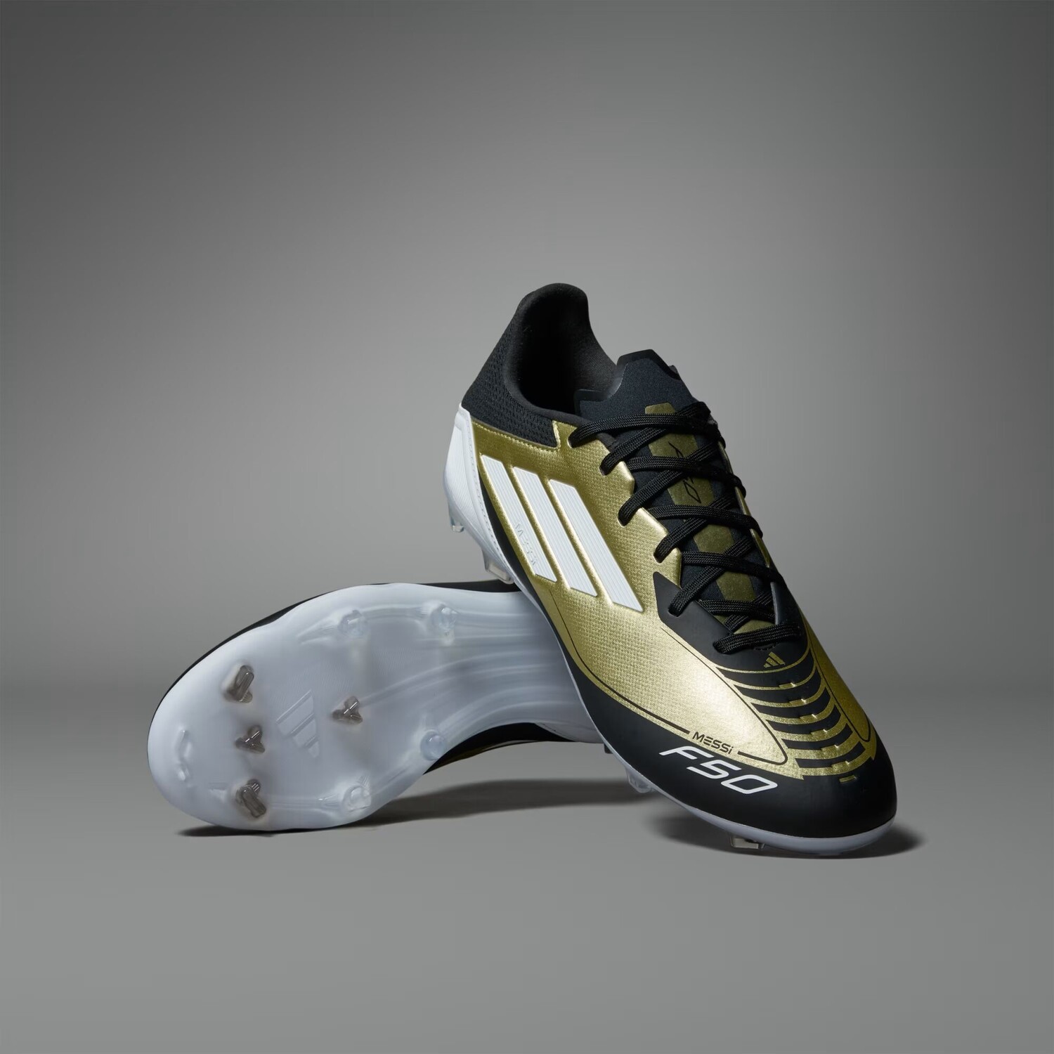 

Фирменные/универсальные футбольные бутсы F50 League Messi Adidas, цвет Gold Metallic/Cloud White/Core Black