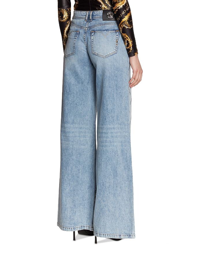 

Versace Jeans Couture Широкие джинсы с украшенным логотипом цвета индиго, синий