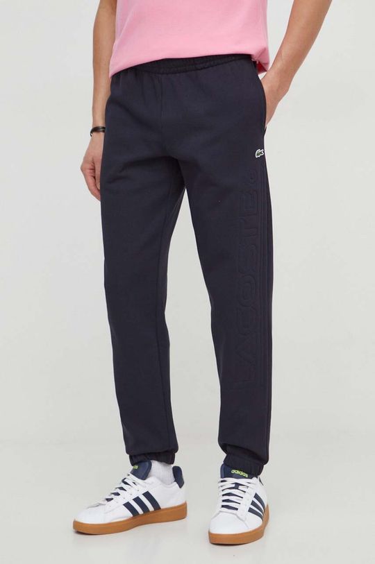 цена Спортивные штаны Lacoste, темно-синий