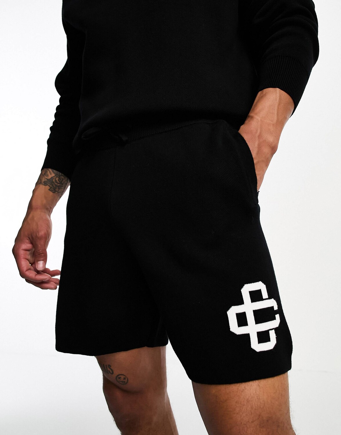 

Черные трикотажные шорты в тон с логотипом The Couture Club