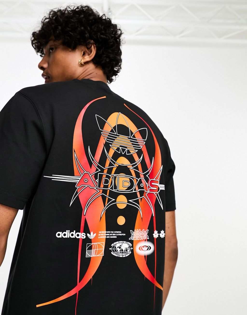 

Черная футболка с большим графическим принтом adidas Originals Rekive, Черный
