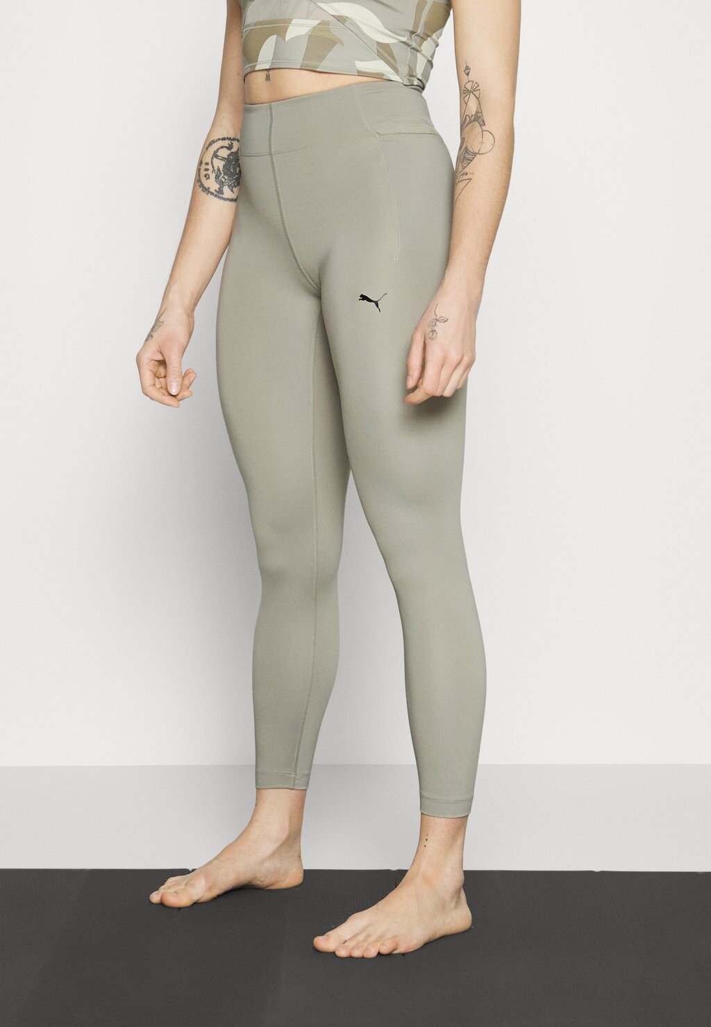 

Тайтсы Puma Studio Your Move Ultrabare 7/8 Tight, бежевый, Серый