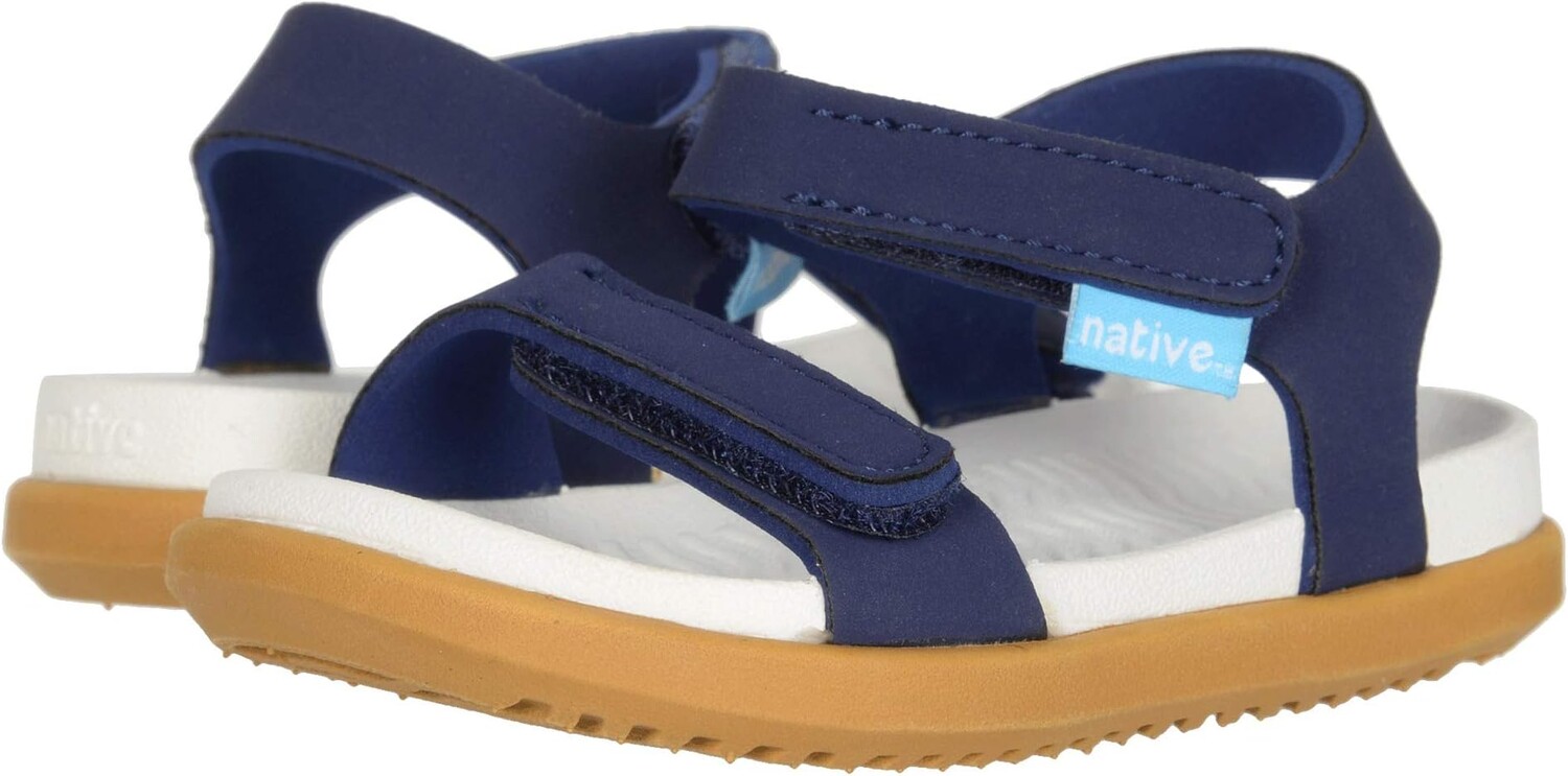 

Сандалии на плоской подошве Charley Native Shoes Kids, цвет Regatta Blue/Shell White/Toffee Brown