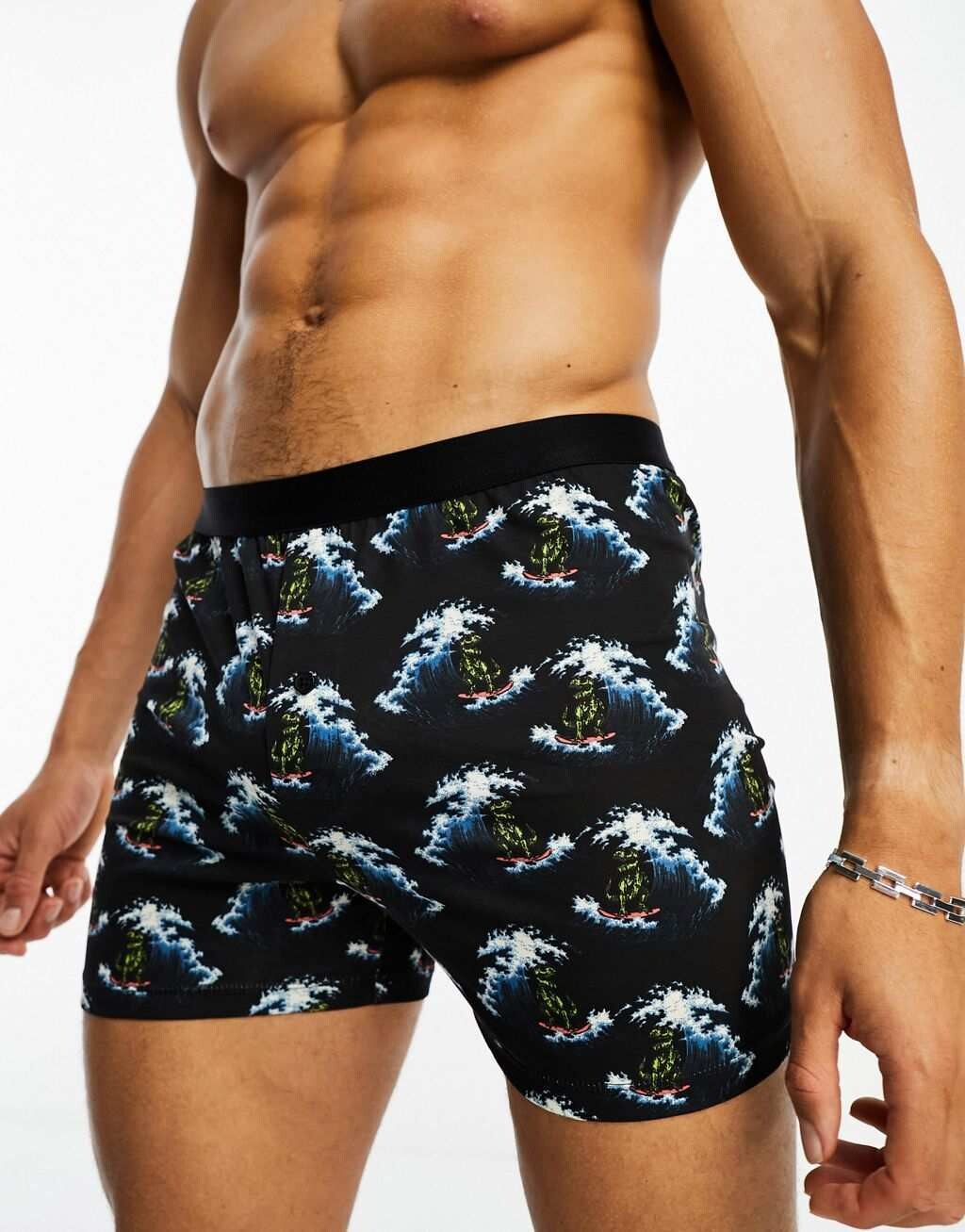 

Черные боксеры с принтом динозавров ASOS DESIGN