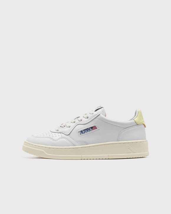 

Кроссовки Autry Action Shoes Wmns Medalist Low, цвет leat/leat wht/lime yl