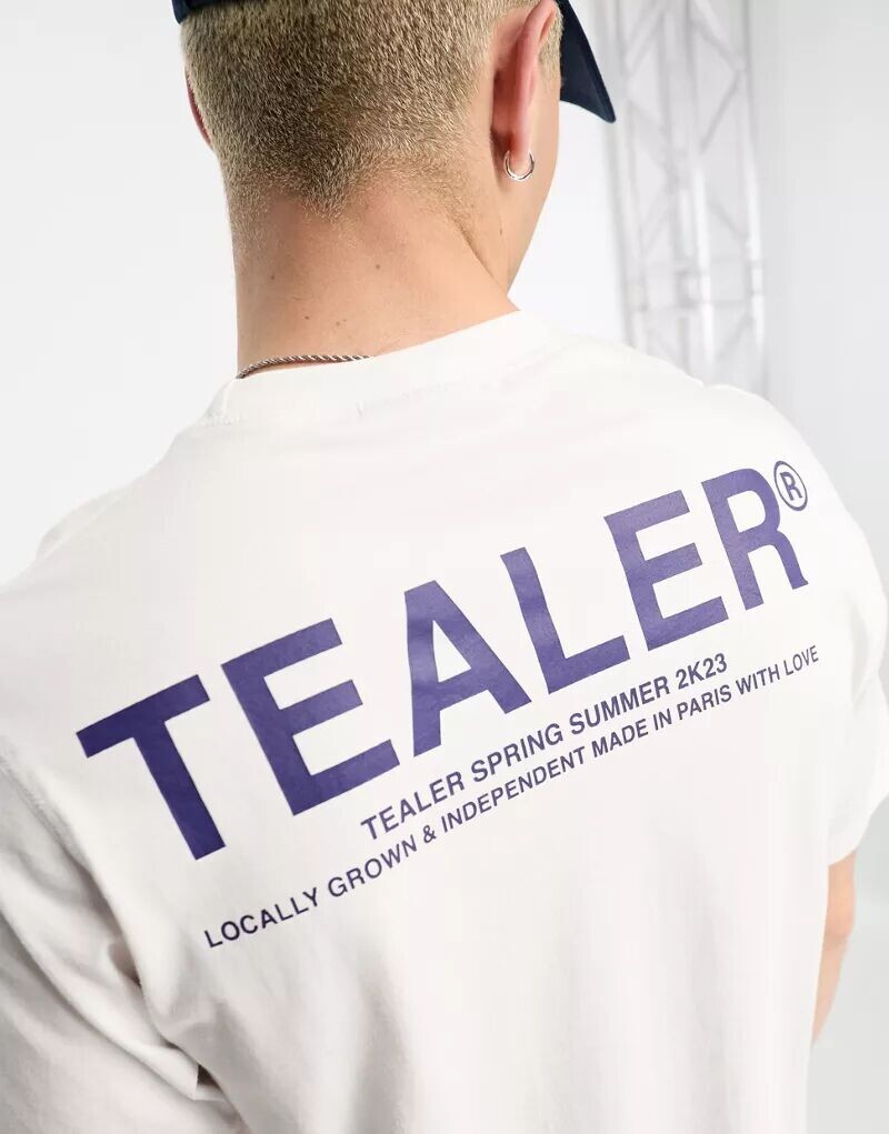 

Белая футболка с логотипом Tealer
