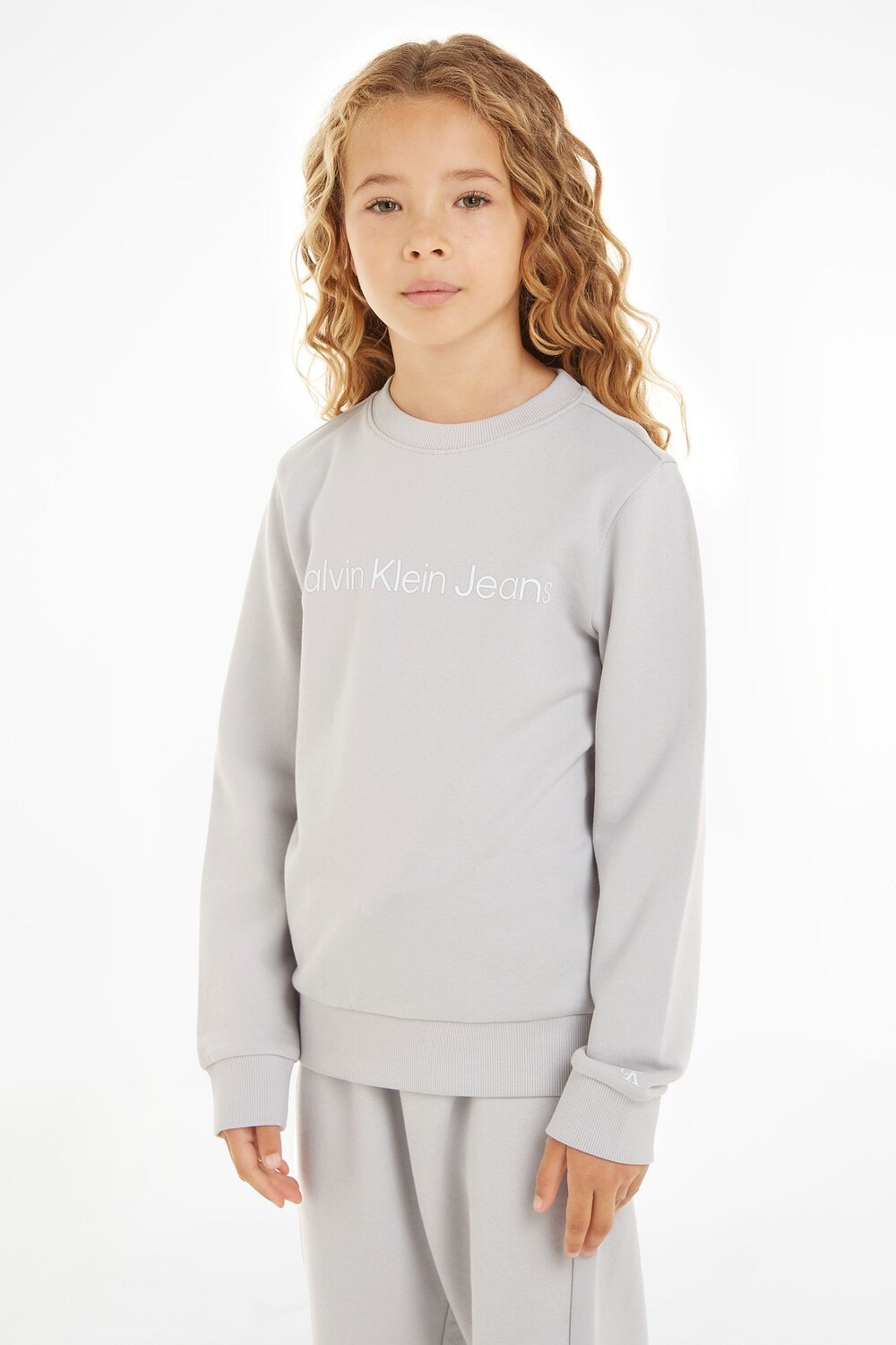 

Слоган на толстовке Calvin Klein, серый