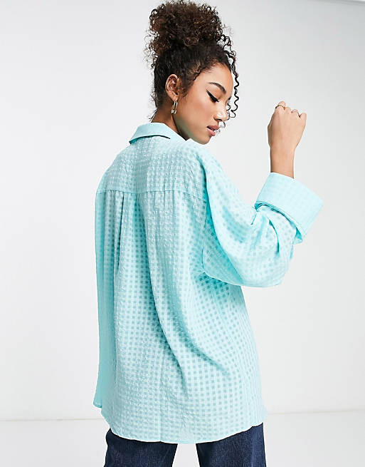 

Голубая клетчатая рубашка оверсайз с широкими манжетами ASOS DESIGN
