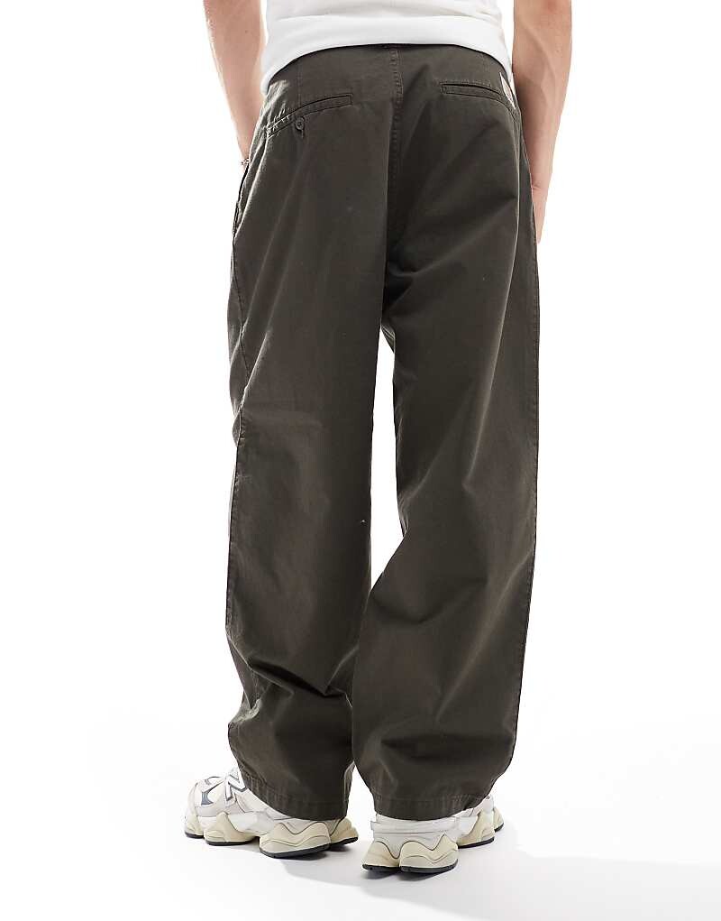 

Carhartt WIP – Merrick – Зауженные зеленые брюки