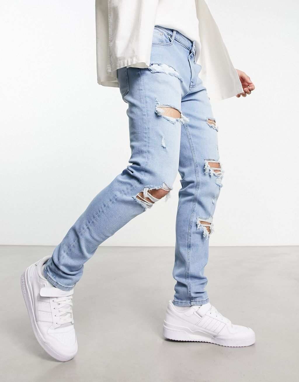 

Светло-голубые джинсы скинни с рваными краями ASOS DESIGN
