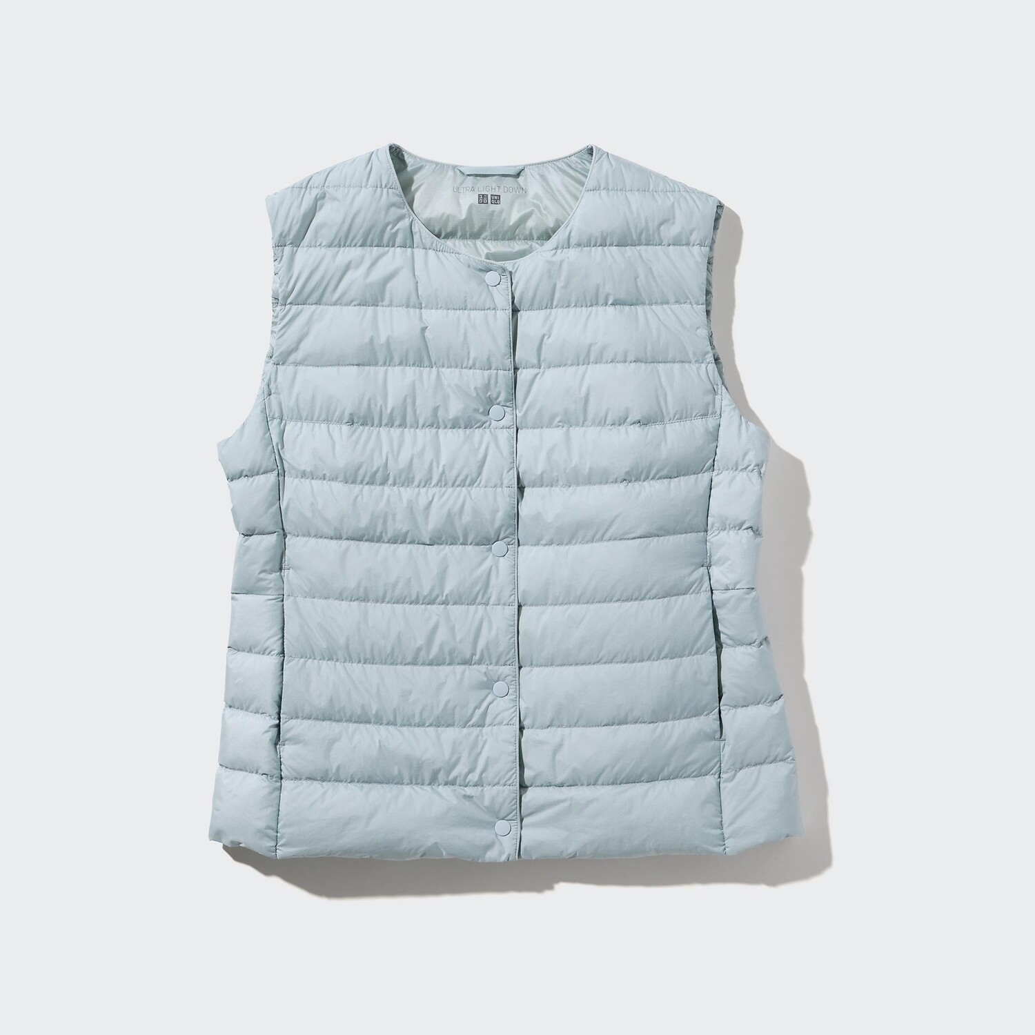 

Сверхлегкий компактный пуховик UNIQLO, светло-синий