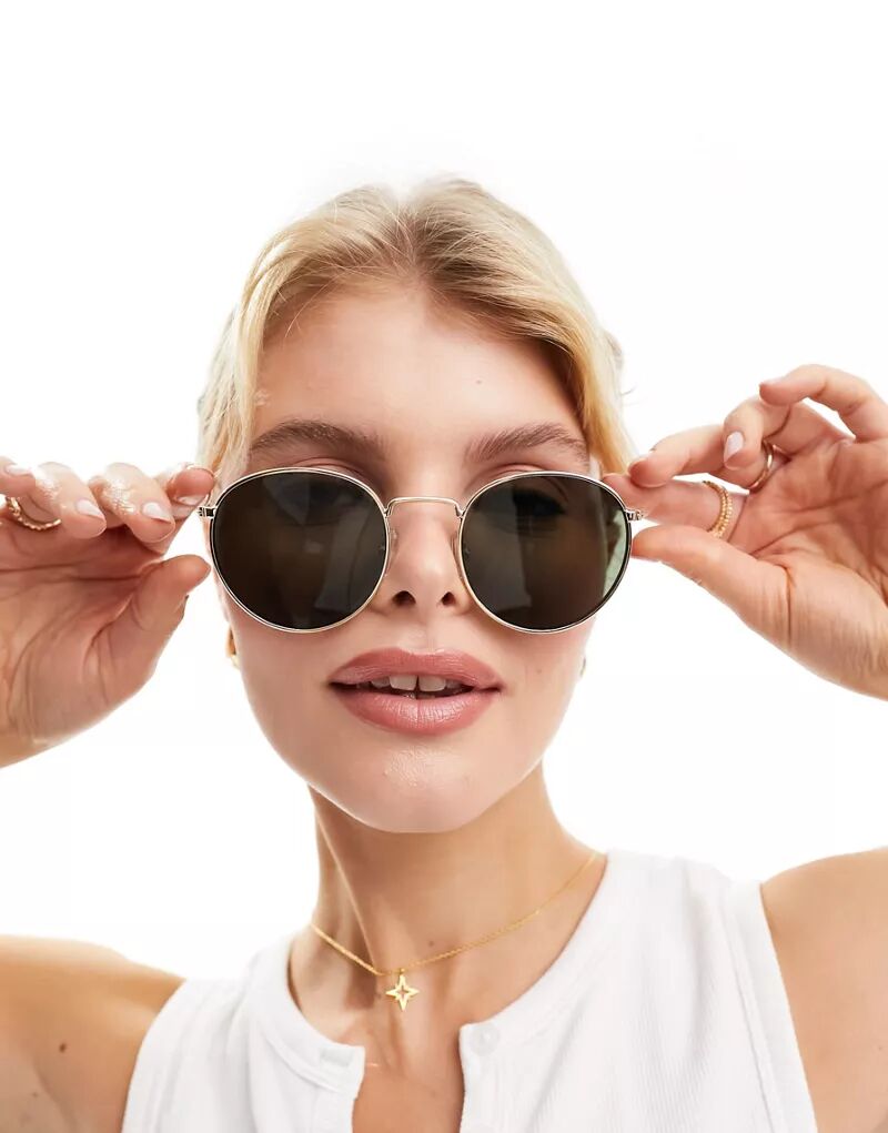 Круглые золотистые солнцезащитные очки унисекс Weekday Explore
