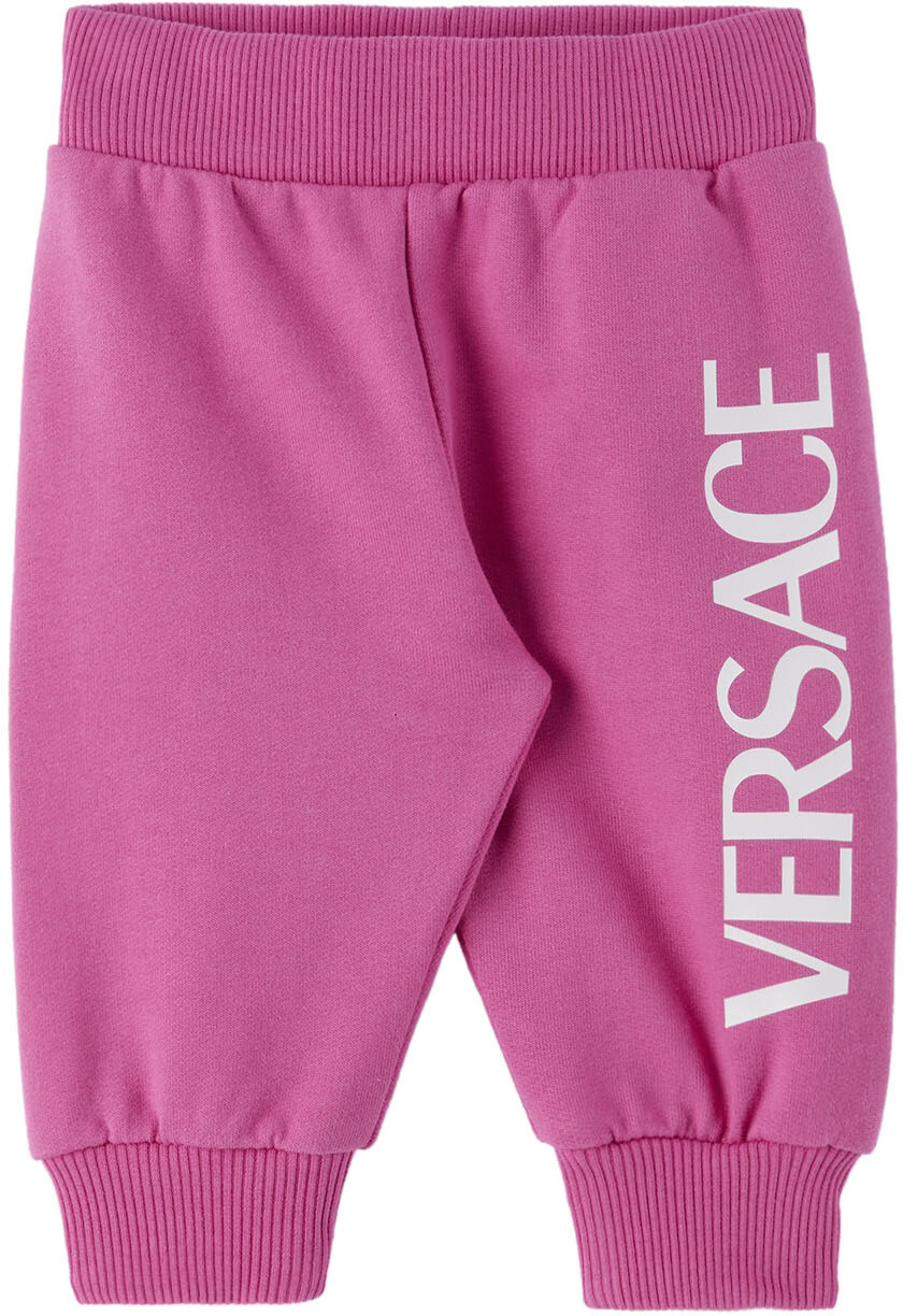 

Детские розовые брюки для отдыха с логотипом и принтом Фуксия Versace