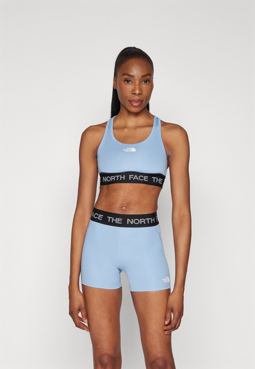 

Спортивный бюстгальтер средней поддержки TECH BRA The North Face, цвет steel blue