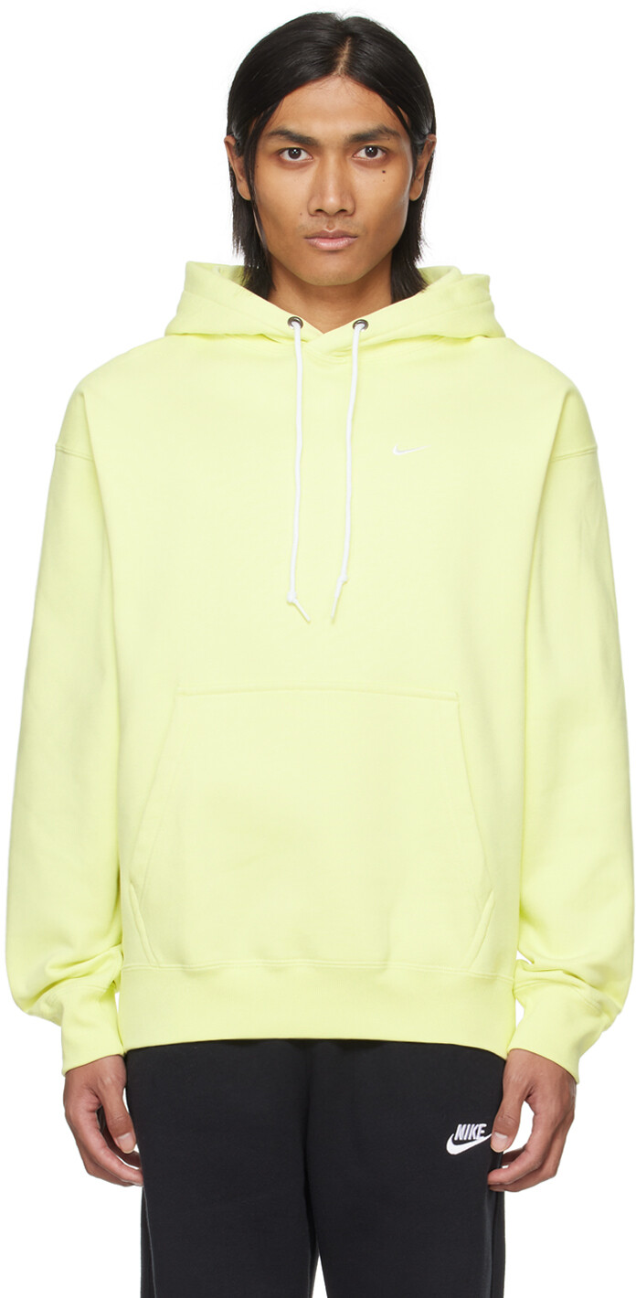 

Желтая худи Solo с галочкой Nike