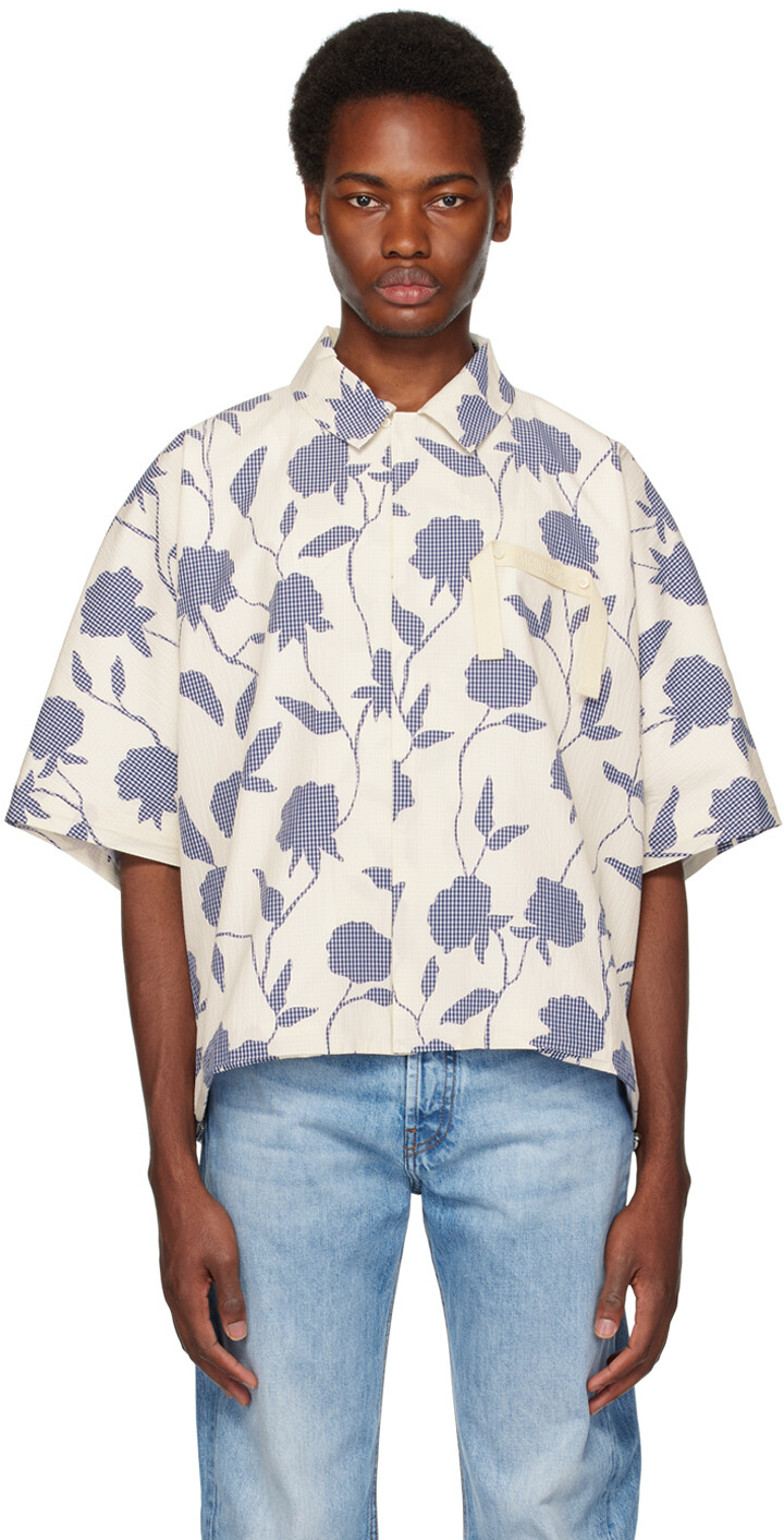 

Бело-темно-синяя рубашка Jacquemus Le Chouchou La Chemise Disgreghi