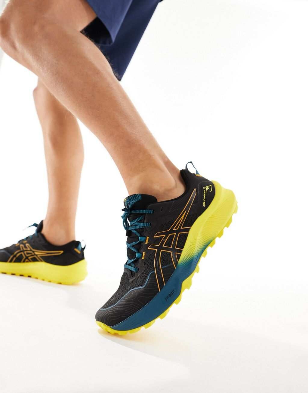 

Черно-желтые кроссовки для бега Asics Trabuco 11