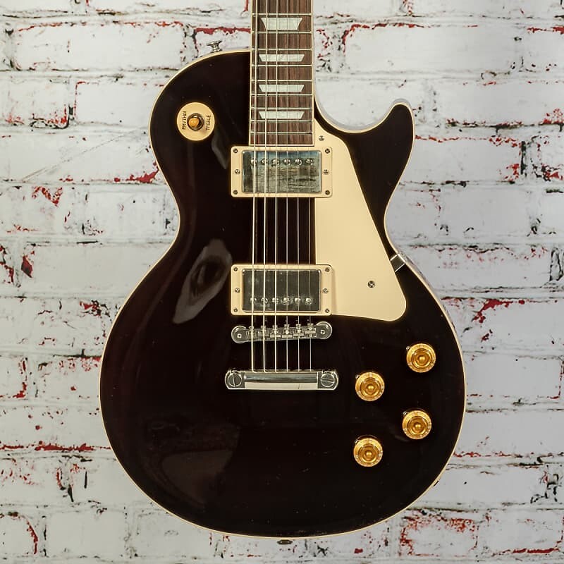 

Электрогитара Gibson - Les Paul Standard 50s Figured Top - Electric Guitar - Translucent Oxblood - w/ Hardshell Case