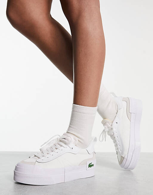 

Белые кроссовки на платформе Lacoste L004