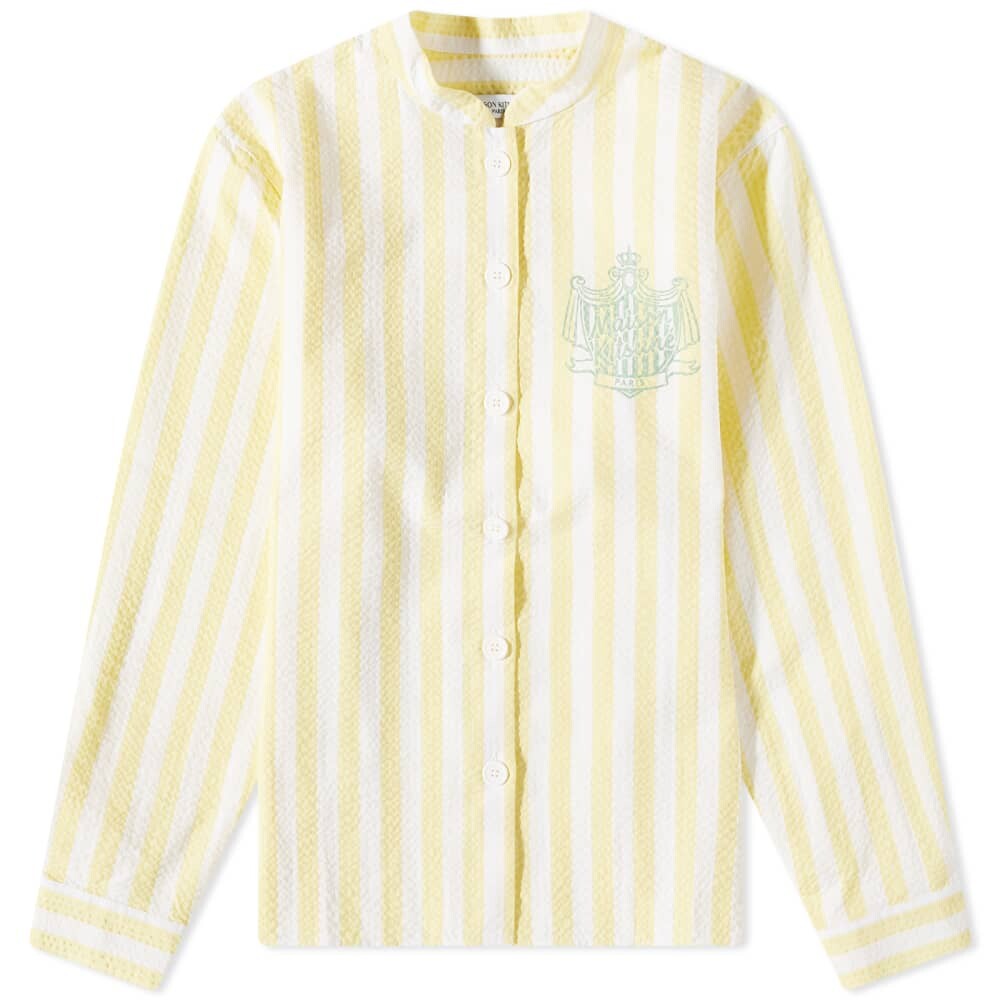 

Рубашка в полоску Maison Kitsune у бассейна