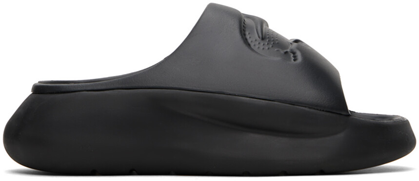 

Черные шлепанцы для подачи Lacoste