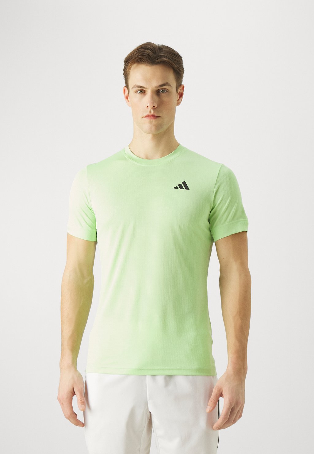 цена Спортивная футболка Freelift T Adidas, цвет semi green spark/green spark