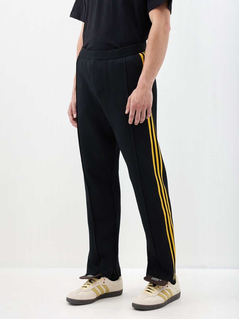 

Спортивные брюки из переработанной вязки в полоску с вышитым логотипом Adidas X Wales Bonner, черный