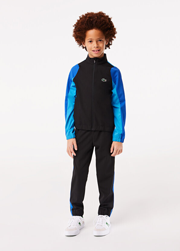 

Черный спортивный костюм для мальчика с цветными блоками Lacoste